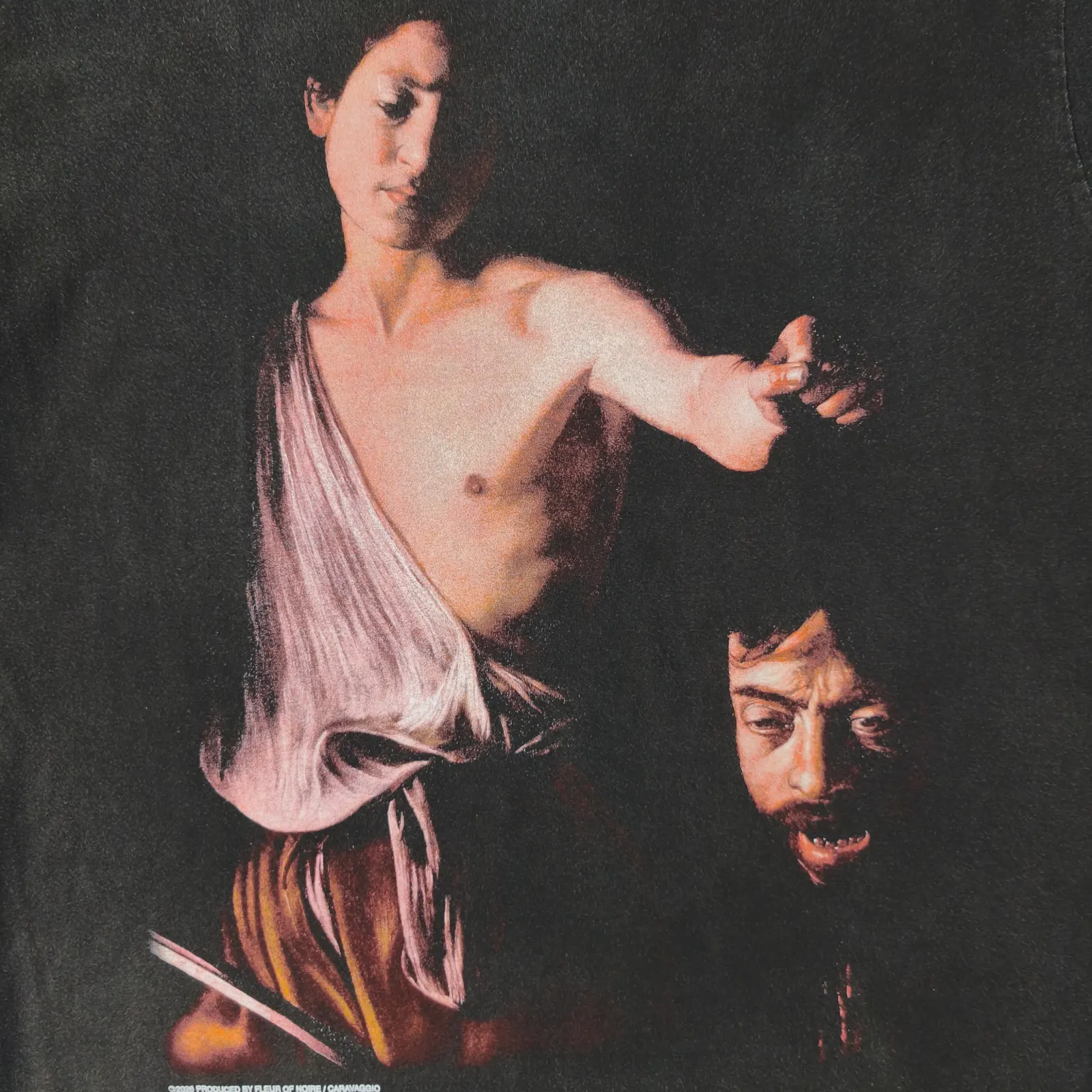 David with the Head of Goliath By Caravaggio